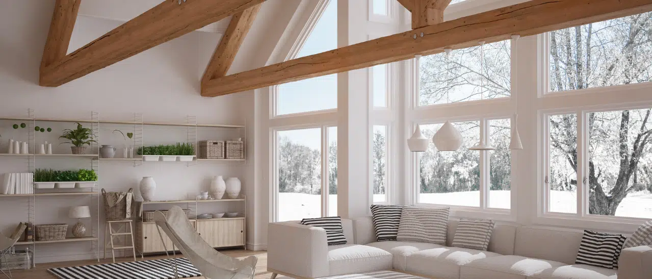 Modern eingerichteter Wohnraum mit Panoramafenster, Gardinen für Gemütlichkeit, Jalousien, Rollläden und Plissees für optimalen Schutz.